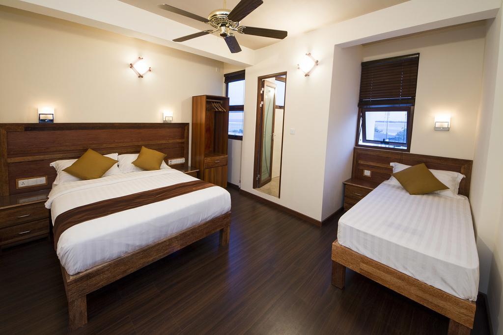 Готель Tropic Tree Maldives Ґалі Номер фото